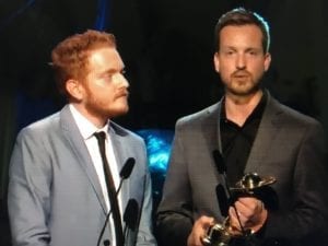 Scott Beck and Bryan Woods winning a Saturn Award for "A Quiet Place"