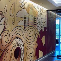 EXCLUSIVE: TBK Bank Opens In Downtown Bettendorf With New Metro Arts Murals