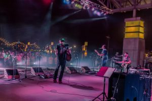 The roots rock jam band The Dawn playing at the 2019 fest at Schwiebert Park, downtown Rock Island.