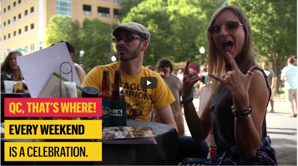 People enjoying beer outside in downtown Davenport in the new promotional video