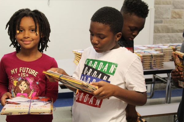 Rock Island's Artsy Bookworm Store Donates Books To Rock Island Students