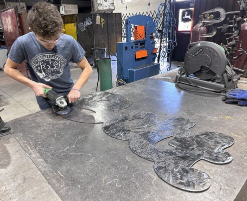 Bettendorf High School Industrial Building Students Working On New Bett Signs