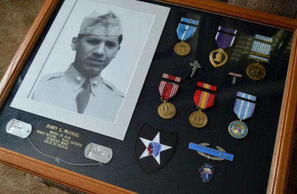 John Munos (who was killed at 23 in the Korean War in August 1951) and his Army medals.
