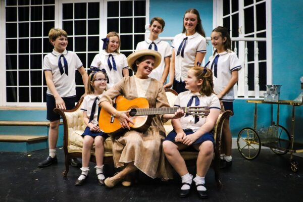 Sarah Lounsberry plays Maria with the von Trapp children in Music Guild's new production of "The Sound of Music," running Nov. 14-23, 2025.
