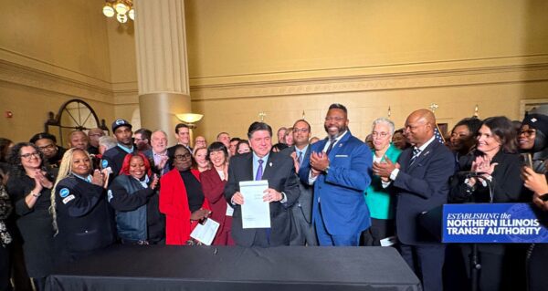 Quad Cities Leaders Attend Chicago Bill Signing for Long-Awaited Rail Service