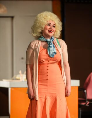 Katie Griswold, a 2020 Augiustana grad, has music directed many Spotlight shows, and stars in the Dolly Parton role in the new "9 to 5" production.