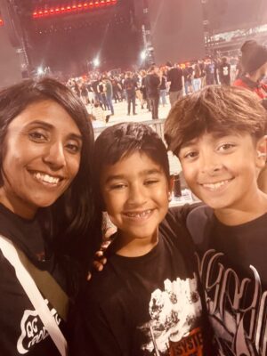 Sudeshna Epping of Bettendorf (left) with her sons Kiran (center) and Raunak.