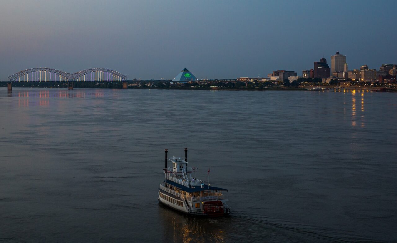 white boat on the mississippi river