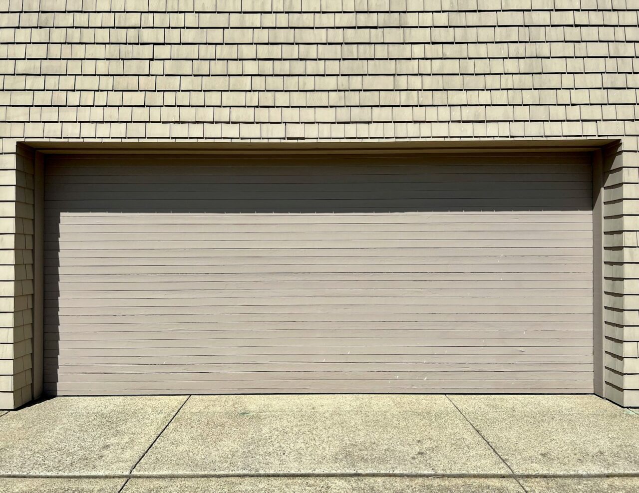 The Tipping Point Between Garage Door Repair and Replacement - QuadCities.com