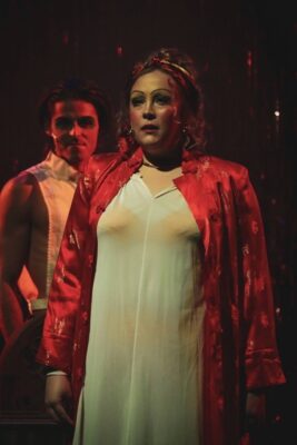 John Whitson as Emcee and Madison Duling as Fraulein Kost.