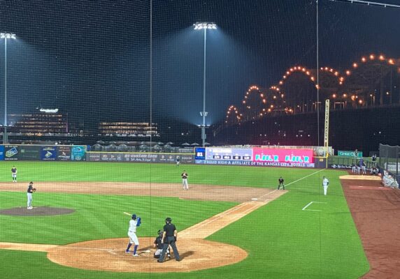 The lighted arches of Centennial Bridge seen from a River Bandits game at Modern Woodmen Park, Davenport. (photo by Jonathan Turner)