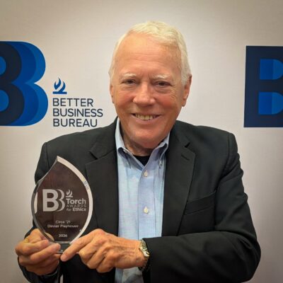 Circa '21 Dinner Playhouse owner and founder Denny Hitchcock accepted his theater's award from the Better Business Bureau.